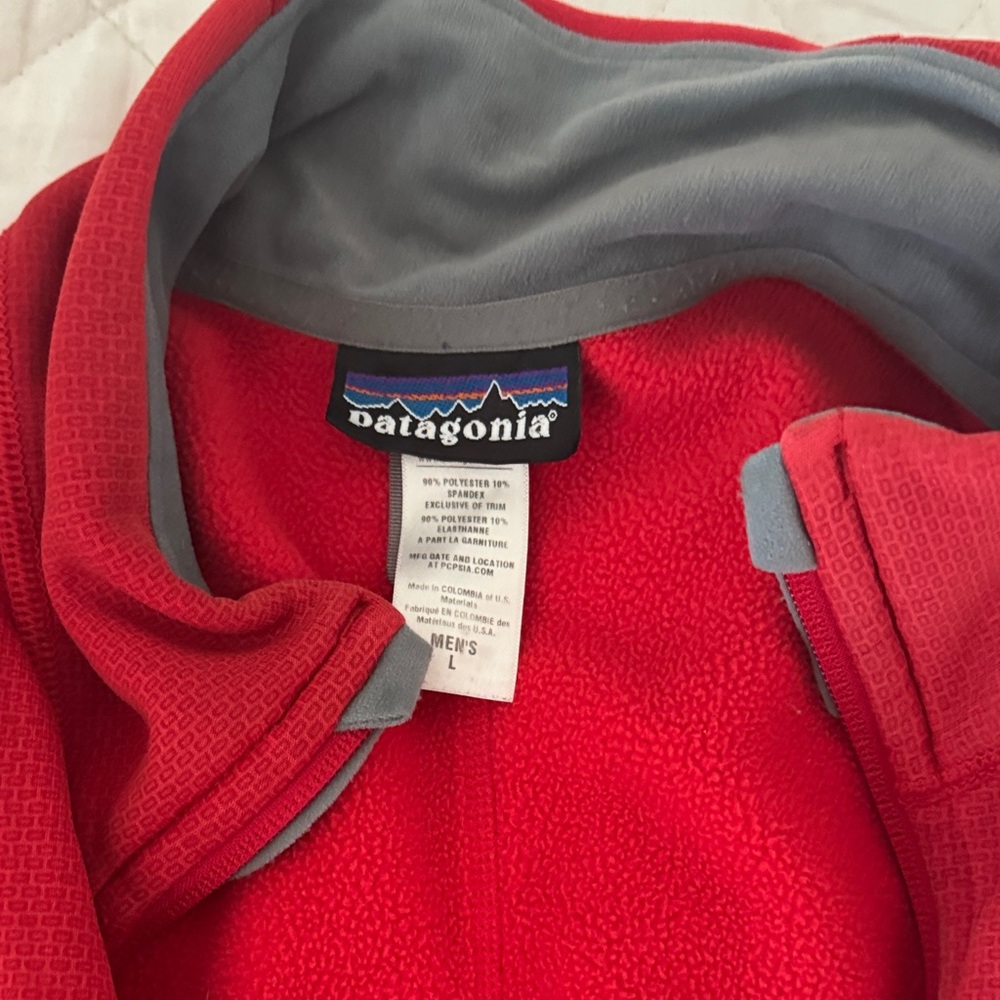 Patagonia Vibrant Red Vest with Gray and orange Accents